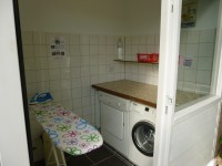 wasmachine, droger, strijkplank- en bout